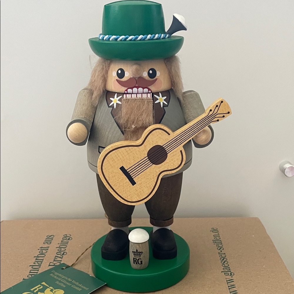 Brand new! Made in Germany Charming Nutcracker Guitar Player Beer